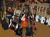 Check out our large selection of acoustic and electric guitars and basses!